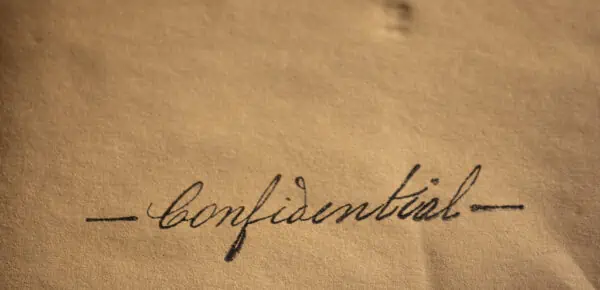 a document with the word confidential on it.