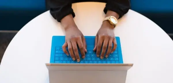 Person Typing on a Laptop